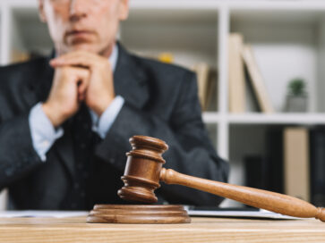 wooden-judge-gavel-table-front-lawyer